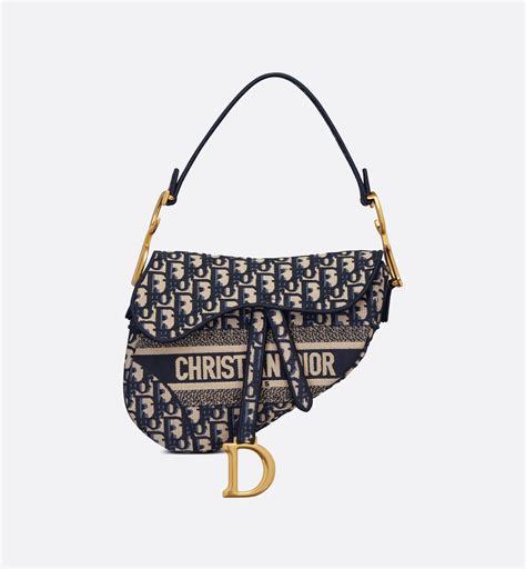 dior oblique embroidered saddle bag|dior saddle bag the real.